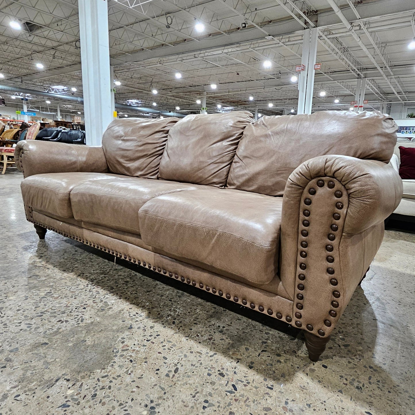 Light Brown Studded Distressed Leather Sofa