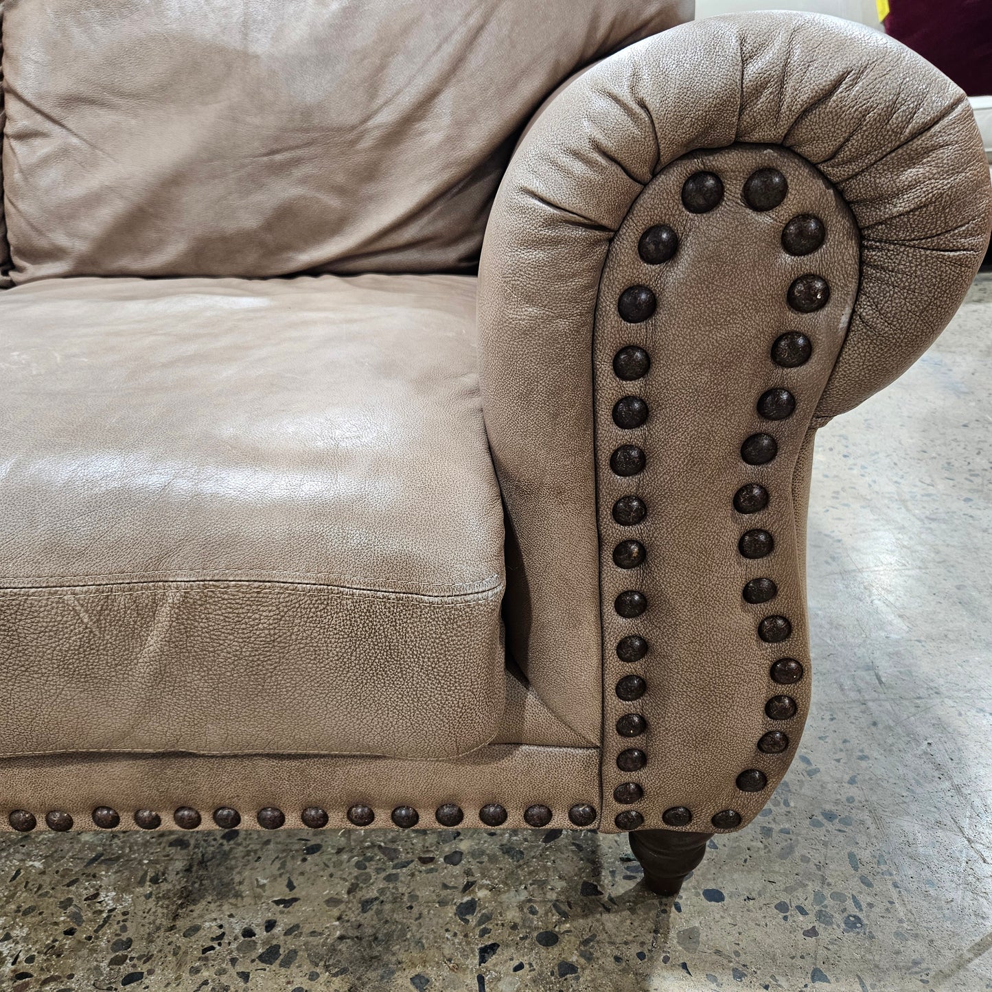 Light Brown Studded Distressed Leather Sofa