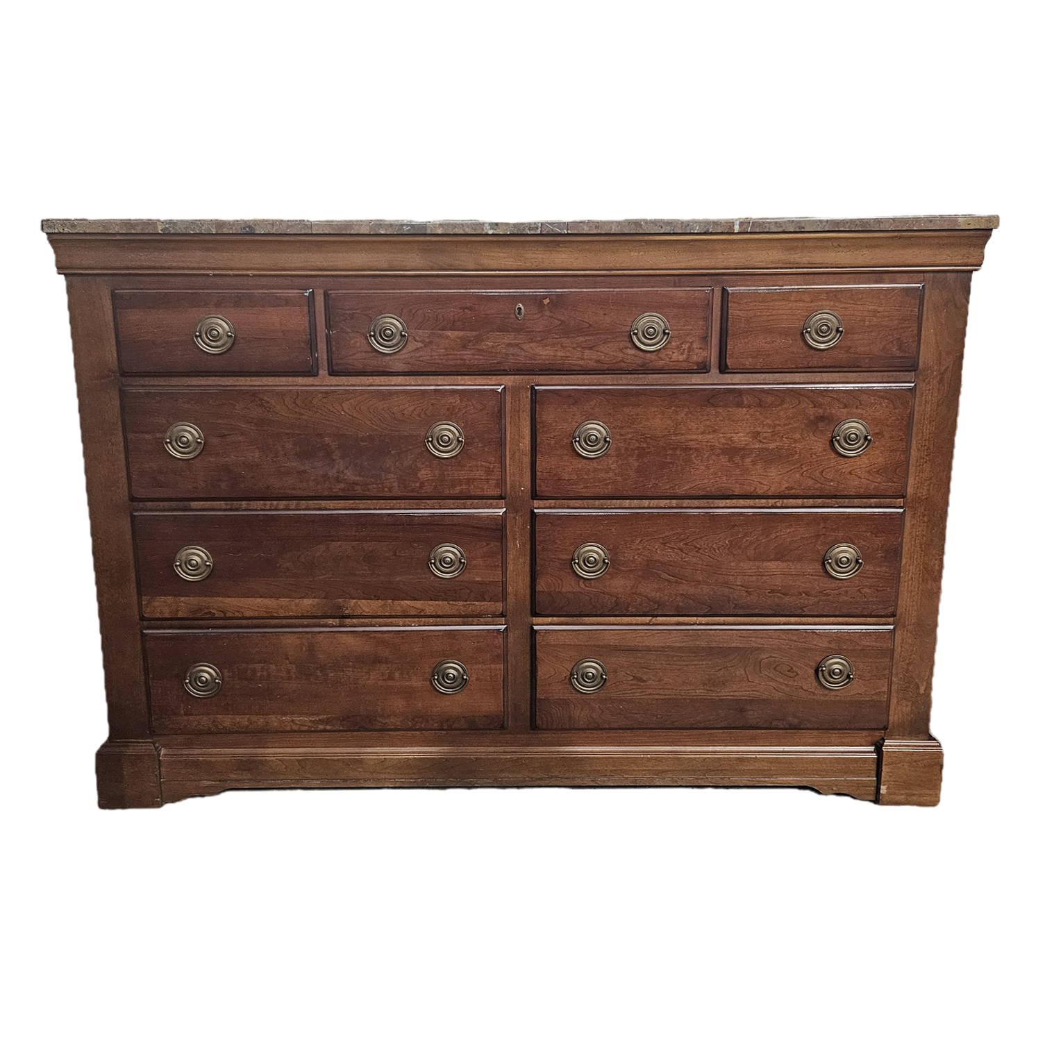 Wooden dresser with multiple drawers on a white background