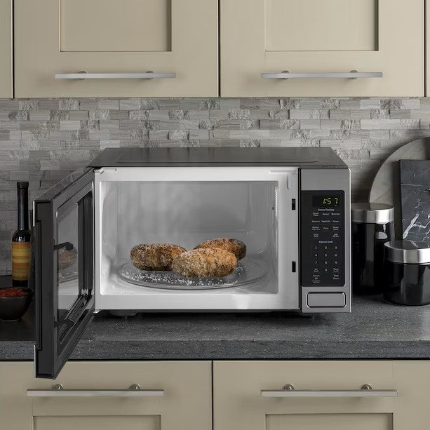 (New) GE Countertop Microwave Oven 1.6 Cu. Ft. in Stainless Steel - GCST16S1WSS