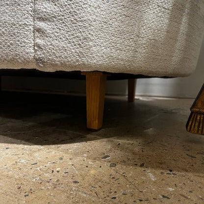 A White Curved Contemporary Sofa