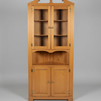 Medium Tone Glass Front Wood Corner Cabinet
