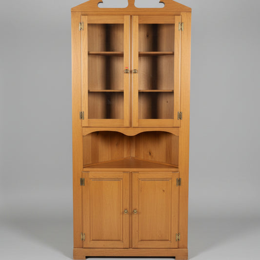 Medium Tone Glass Front Wood Corner Cabinet