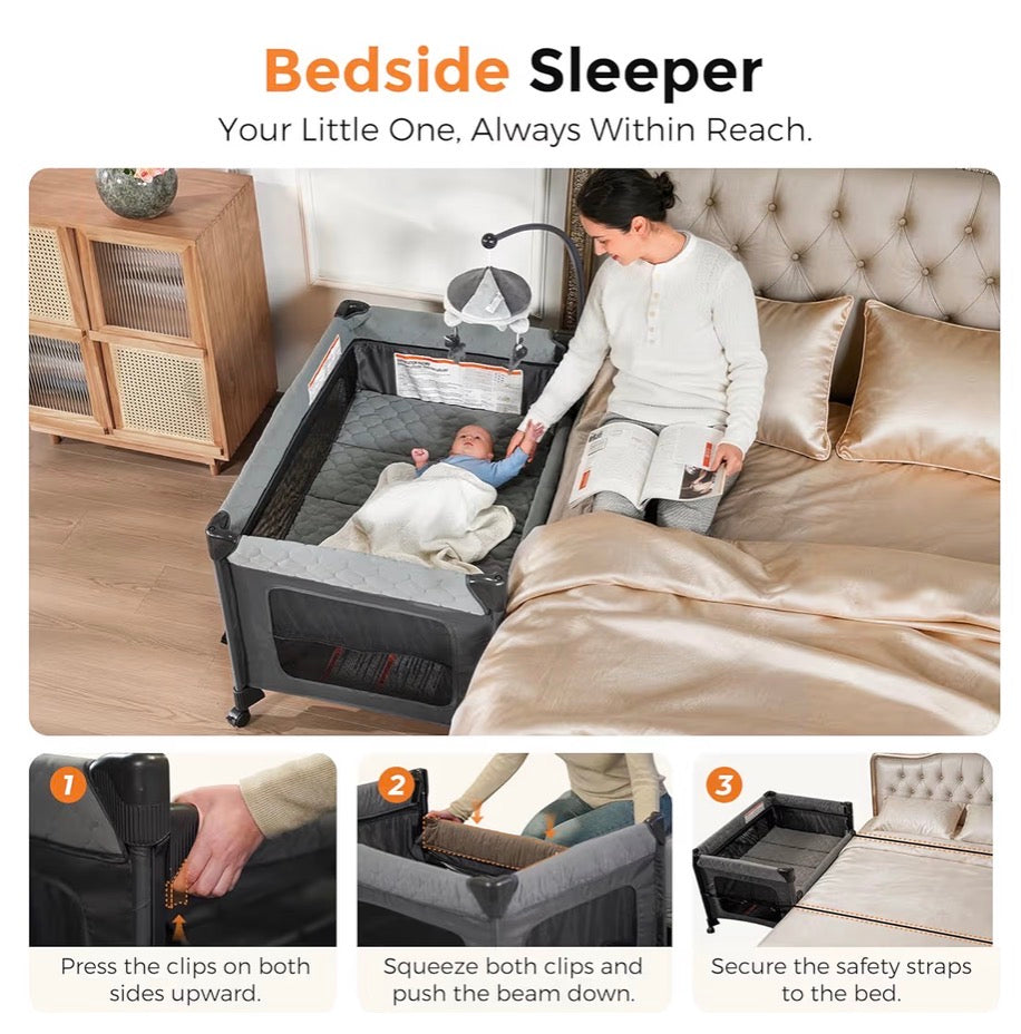 Pamo Babe Pack and Play with Bassinet - 7 in 1 one step setup bedside crib , portable playpen, travel crib, baby play yard with diaper changing station, toy bar & large storage bag