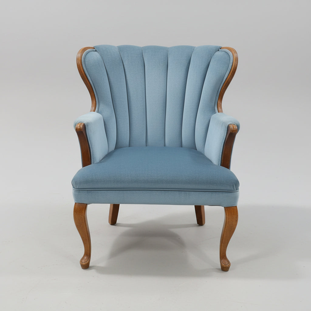 Blue  Upholstered Shell Back Armchair with Carved Wood