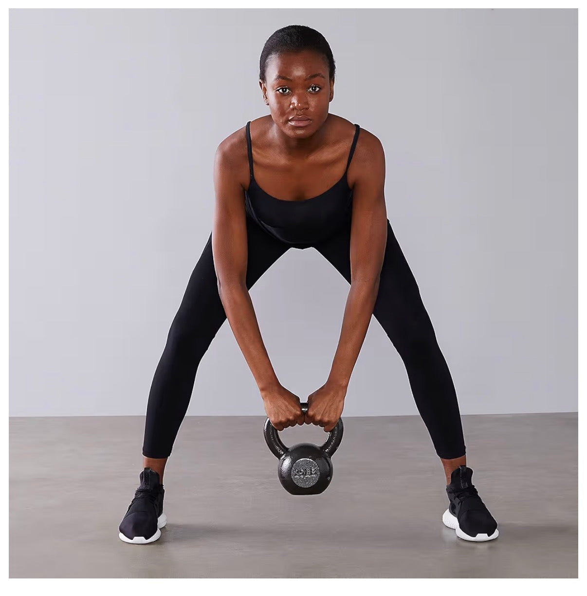 Amazon Basics Cast Iron Kettlebell for Strength Training, Textured Wide Handle (Black) (New)