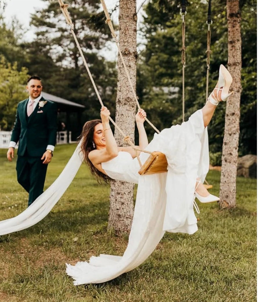 Hanging wooden tree swing for adults and kids
