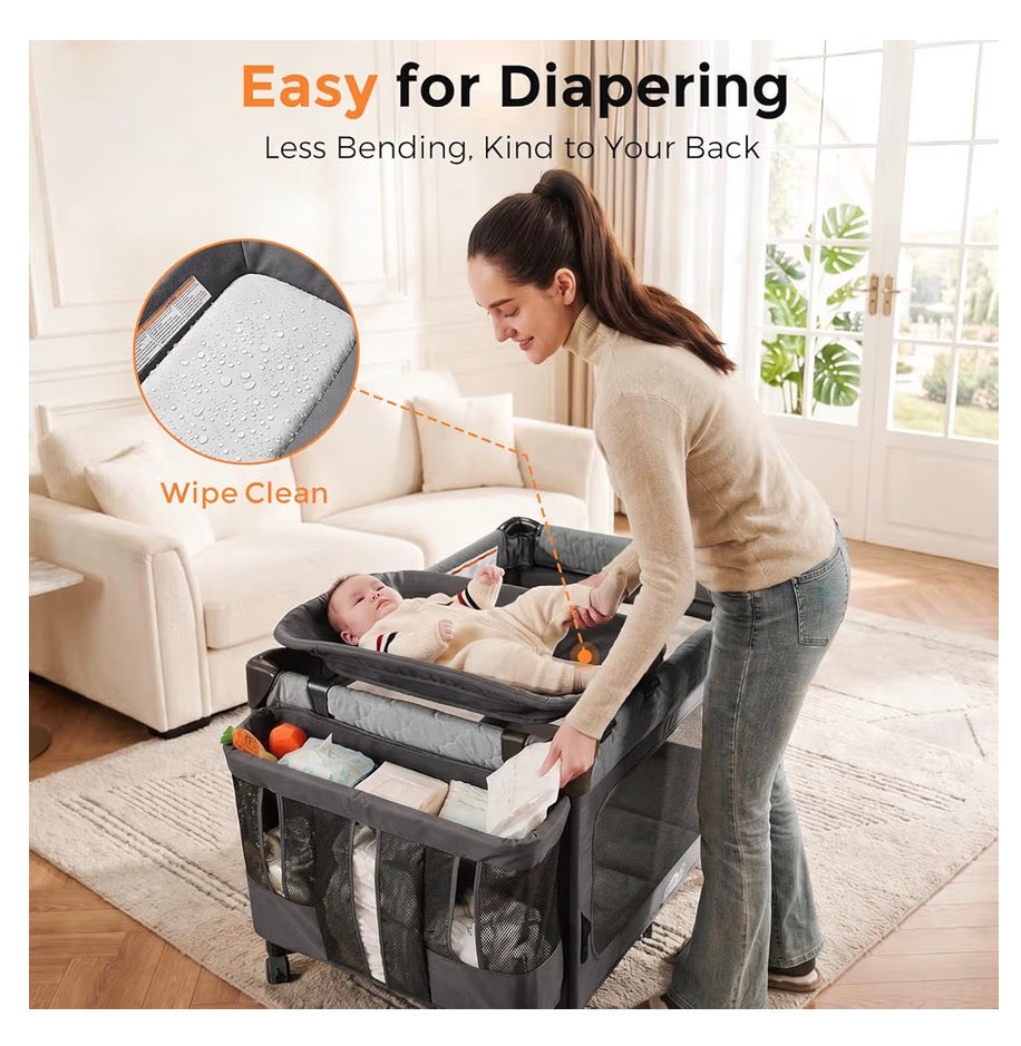 Pamo Babe Pack and Play with Bassinet - 7 in 1 one step setup bedside crib , portable playpen, travel crib, baby play yard with diaper changing station, toy bar & large storage bag